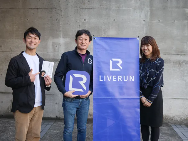 A LIVERUN session photograph marking Naoko Takahashi's guest appearance — Sydney Olympic Marathon gold medalist — pictured with members of the LIVERUN team